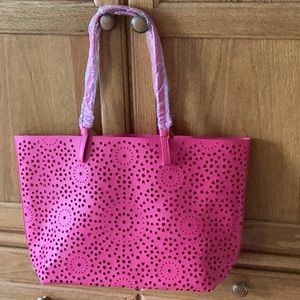 New! Hot pink heavyweight vinyl tote with perforated pattern. NWOT